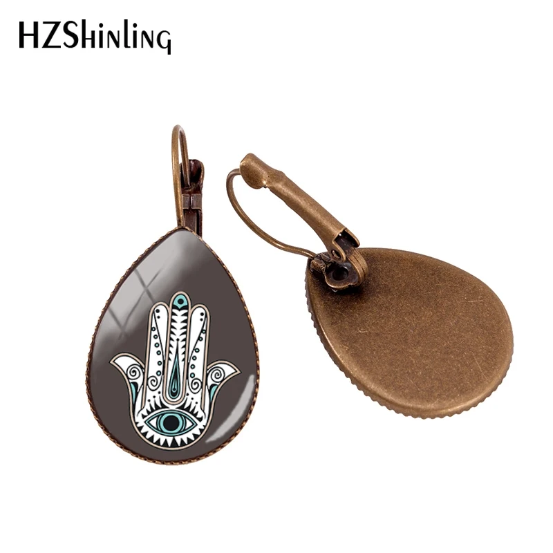 2019 New Hand Of Fatima Water Drop Earring Hamsa Evil Eye Earrings Clips Hand Of Miriam Drop Ear Clip Glass Dome Photo Jewelry
2019 New Hand Of Fatima Water Drop Earring Hamsa Evil Eye Earrings Clips Hand Of Miriam Drop Ear Clip Glass Dome Photo Jewelry