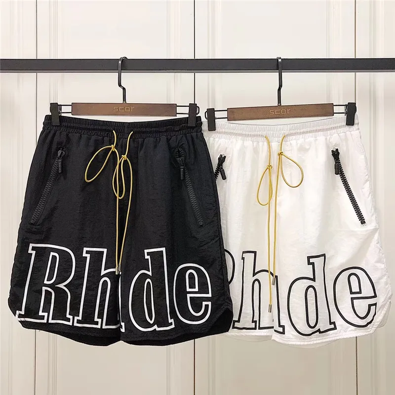 Rhude Shorts Men Streetwear Joggers Big Logo Mesh Yellow Drawstring Rhude Short Pants New York Limited Zipper Pocket Shorts
Rhude Shorts Men Streetwear Joggers Big Logo Mesh Yellow Drawstring Rhude Short Pants New York Limited Zipper Pocket Shorts