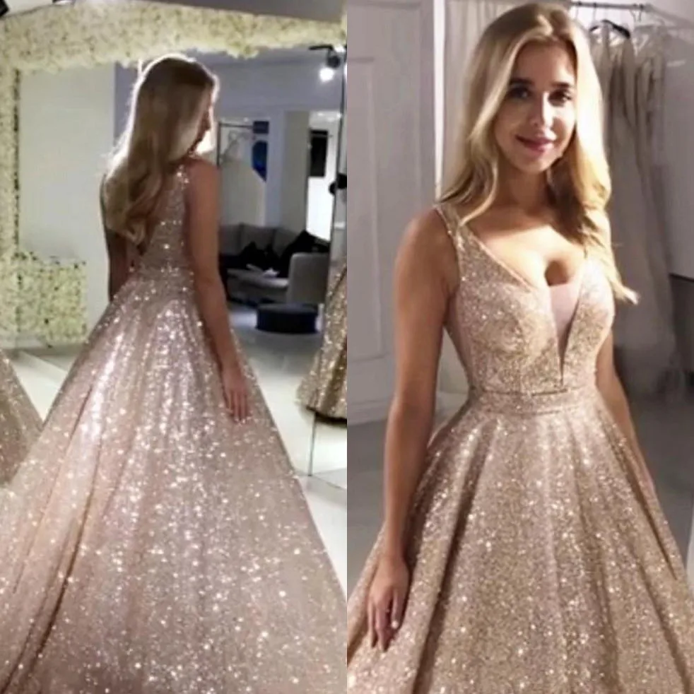 Gorgeous Rose Gold Sequins Prom Gowns Formal Dress 2019 V Neck Sparkly Sequin A-line Backless Evening Party Dress Robe De Soiree
Gorgeous Rose Gold Sequins Prom Gowns Formal Dress 2019 V Neck Sparkly Sequin A-line Backless Evening Party Dress Robe De Soiree