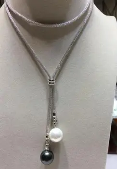 New natural charm black and white shell imitation pearl necklace 25 inches>>> free shipping
New natural charm black and white shell imitation pearl necklace 25 inches>>> free shipping
