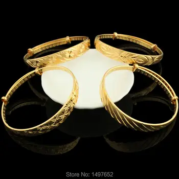2017 Dubai gold jewelry bangle/bracelet for African women Gold Color push-and-pull Ethiopian bangle 
2017 Dubai gold jewelry bangle/bracelet for African women Gold Color push-and-pull Ethiopian bangle