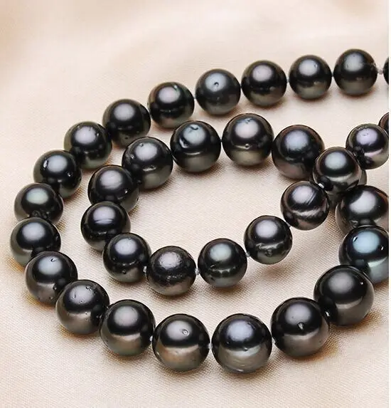 Free Shipping Tahitian genuine black pearl necklace 18"8-9mm perfect round aaa (09.08)
Free Shipping Tahitian genuine black pearl necklace 18"8-9mm perfect round aaa (09.08)