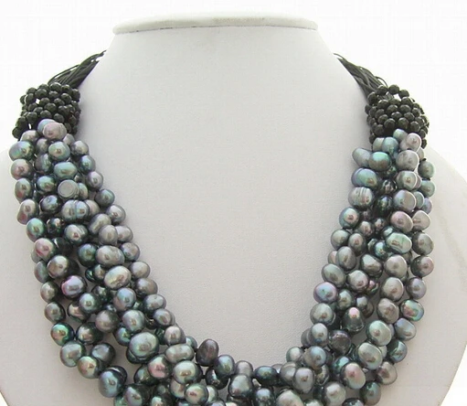 huij 003502 7Strds Black Pearl&Onyx Necklace
huij 003502 7Strds Black Pearl&Onyx Necklace