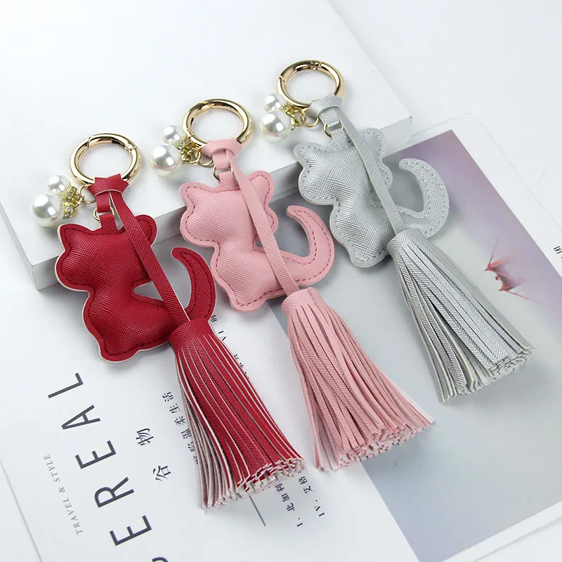 Leather Cute Cartoon Persian Cat PU Leather Tassel Pearl Key Ring Pendant Car Bag Accessories Hanging Jewelry Lady keychain
Leather Cute Cartoon Persian Cat PU Leather Tassel Pearl Key Ring Pendant Car Bag Accessories Hanging Jewelry Lady keychain