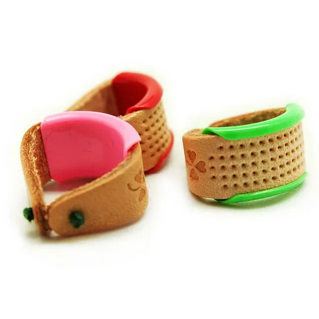 Adjustable Ring Finger Thimble Plastic and Soft Leather Thimble Finger Protector Needles Partner Sewing Tools Accessory 2pieces
Adjustable Ring Finger Thimble Plastic and Soft Leather Thimble Finger Protector Needles Partner Sewing Tools Accessory 2pieces
