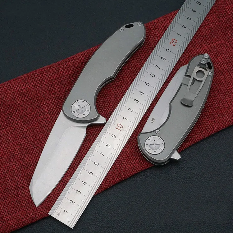 Outdoor TC4 titanium alloy folding knife D2 high hardness 58-59HRC self-defense multifunctional ball bearing survival knife
Outdoor TC4 titanium alloy folding knife D2 high hardness 58-59HRC self-defense multifunctional ball bearing survival knife