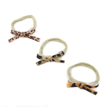 30pcs/lot Leopard Bow Headbands Baby Nylon Headband Newborn Baby Photography Props Infant Hair Accessory Queenbaby
30pcs/lot Leopard Bow Headbands Baby Nylon Headband Newborn Baby Photography Props Infant Hair Accessory Queenbaby