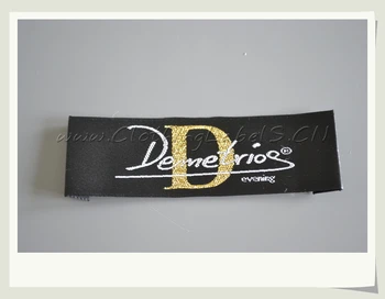 custom clothing labels with brand logo and gold thread on background, end folded,eco-friendly
custom clothing labels with brand logo and gold thread on background, end folded,eco-friendly