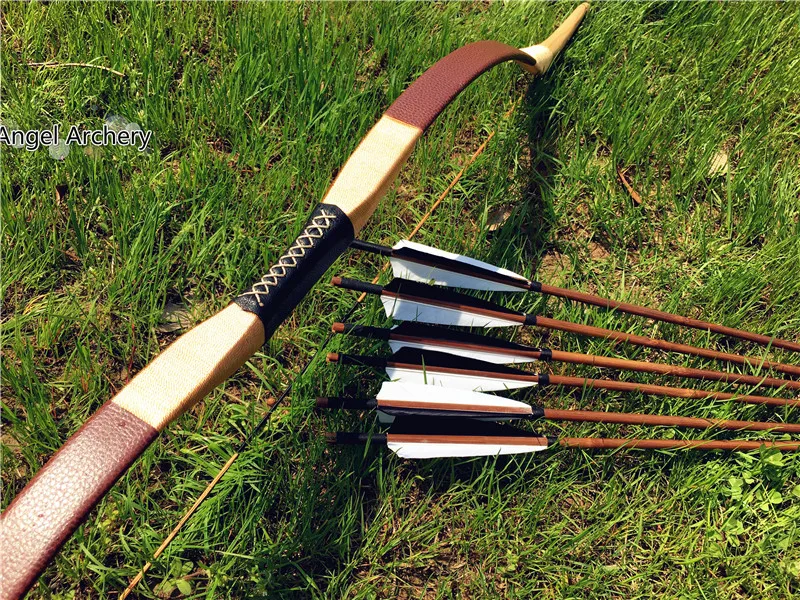 Traditonal Brown leather Longbow 20lb-60lb Recurve bow Add 6 bamboo arrows For longbow hunting equipment
Traditonal Brown leather Longbow 20lb-60lb Recurve bow Add 6 bamboo arrows For longbow hunting equipment