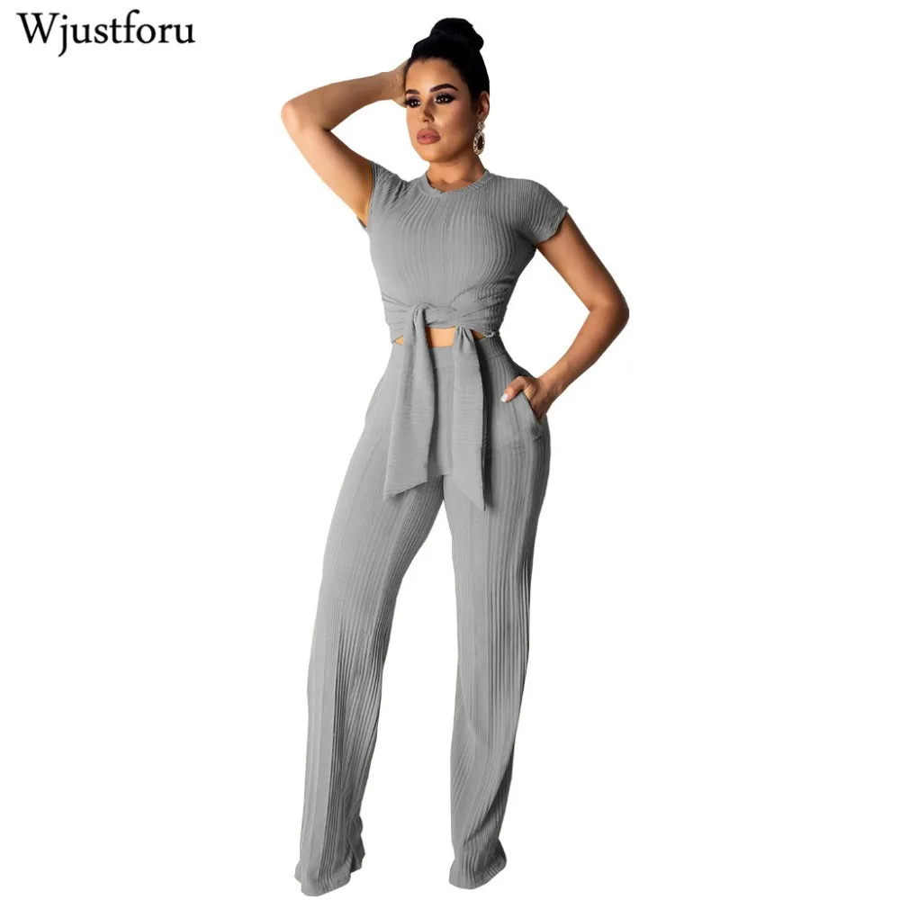 Wjustforu Women Knitted Tracksuit High Stretchy Ribbed Front Tie Short Sleeve Crop Top + Wide Leg Pants Casual Two Piece Set
Wjustforu Women Knitted Tracksuit High Stretchy Ribbed Front Tie Short Sleeve Crop Top + Wide Leg Pants Casual Two Piece Set