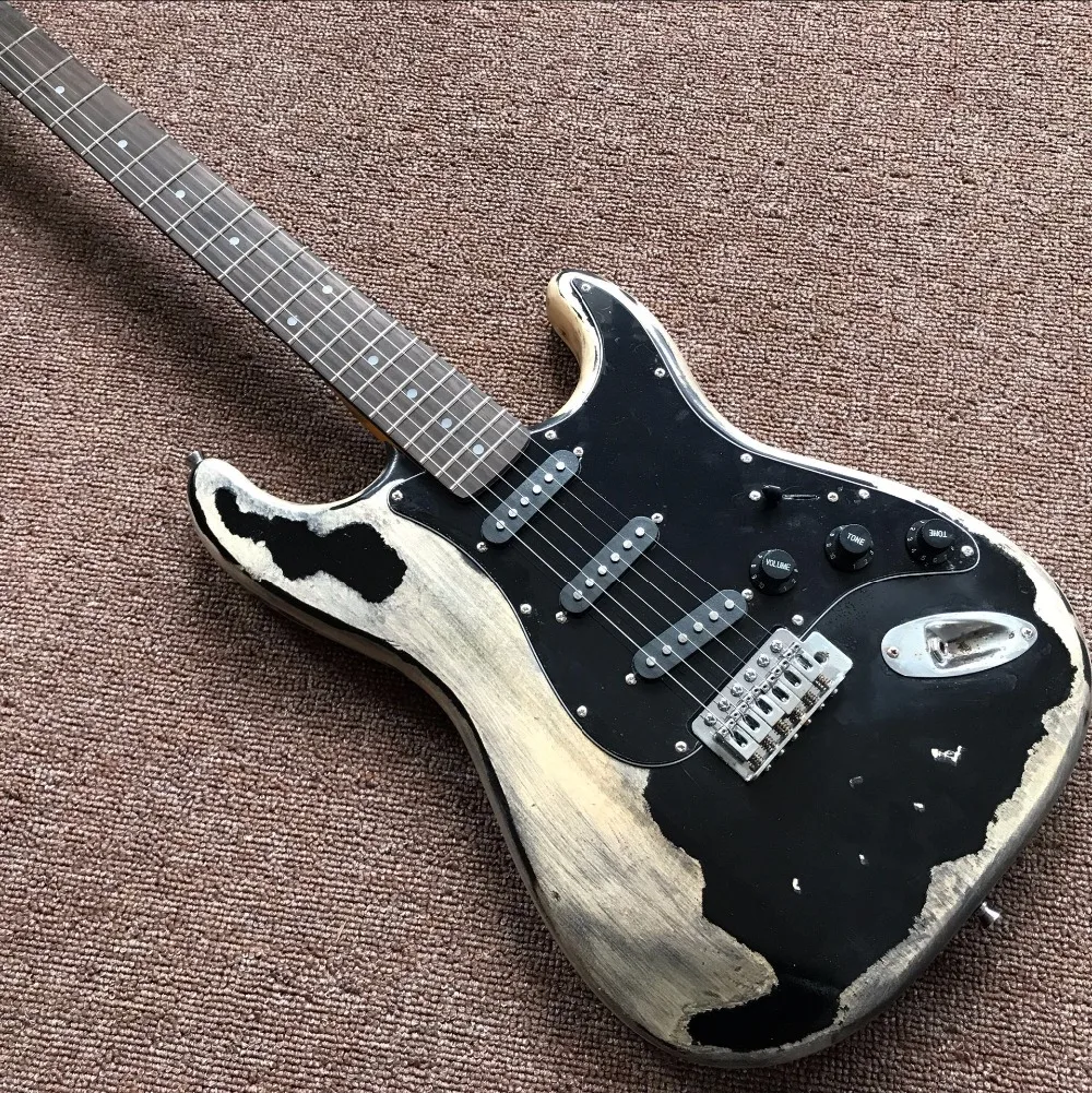 New style high quality relic remains ST electric guitar, handmade aged relic electric guitar, Real photo shows
New style high quality relic remains ST electric guitar, handmade aged relic electric guitar, Real photo shows