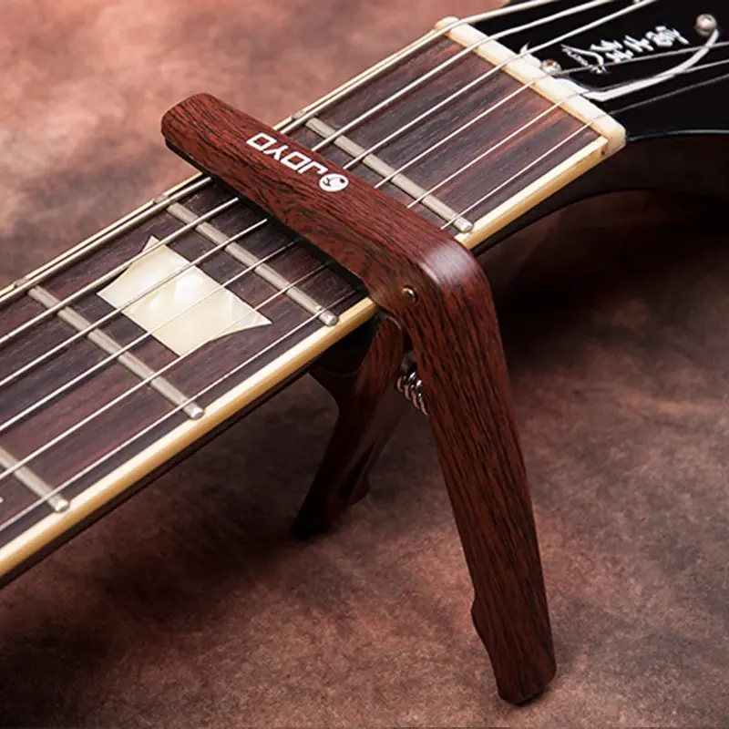 WS JOYO JCP-01 Colorful Plastic Guitar Capo for 6 String Guitars Black Silver Wood colors with picks guitarras Free ship
WS JOYO JCP-01 Colorful Plastic Guitar Capo for 6 String Guitars Black Silver Wood colors with picks guitarras Free ship