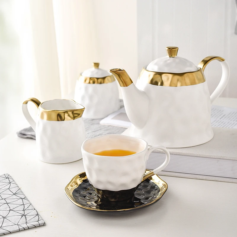 European Style Brief Gold Plated Ceramic Procelain Fragrant Coffee Mug with Saucer Lead-free Tea Pot Sugar Cans Milk Kettle Gift
European Style Brief Gold Plated Ceramic Procelain Fragrant Coffee Mug with Saucer Lead-free Tea Pot Sugar Cans Milk Kettle Gift
