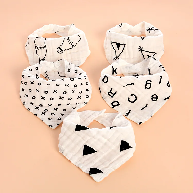 Baby four-layer cotton gauze black and white cartoon printing baby anti-slobber children's snap triangle water towel
Baby four-layer cotton gauze black and white cartoon printing baby anti-slobber children's snap triangle water towel