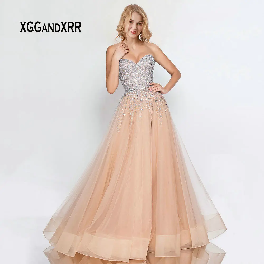 Luxury Prom Dress 2019 Long Tulle Dress Beading Crystal Champagne vestidos de gala Sweetheart Off Shoulder Sexy Backless Party
Luxury Prom Dress 2019 Long Tulle Dress Beading Crystal Champagne vestidos de gala Sweetheart Off Shoulder Sexy Backless Party