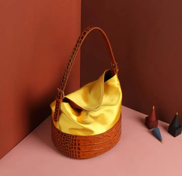 Silk calfskin stitching shoulder bag crocodile pattern retro portable duke bag bucket bag free shipping
Silk calfskin stitching shoulder bag crocodile pattern retro portable duke bag bucket bag free shipping
