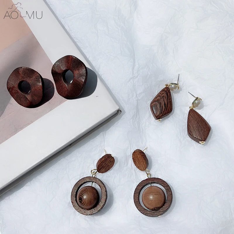AOMU Vintage Design Brown Wooden Geometric Asymmetrical Wave Round Circle Ball Pearl Link Big Stud Earrings for Women Girl Gift
AOMU Vintage Design Brown Wooden Geometric Asymmetrical Wave Round Circle Ball Pearl Link Big Stud Earrings for Women Girl Gift