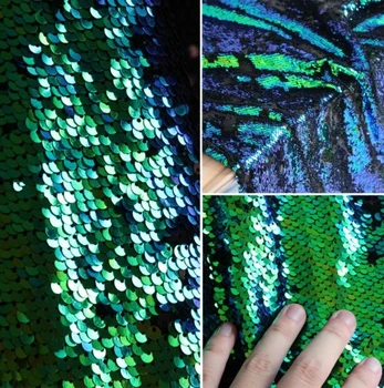 Green Encrypted double-sided color laser polyester fabric discolored fish scale sequins turning textiles Stage fabric C631
Green Encrypted double-sided color laser polyester fabric discolored fish scale sequins turning textiles Stage fabric C631