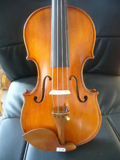 Old Violin 4/4 size , Strad Model , full hand made , nice top and back , mark TA
Old Violin 4/4 size , Strad Model , full hand made , nice top and back , mark TA