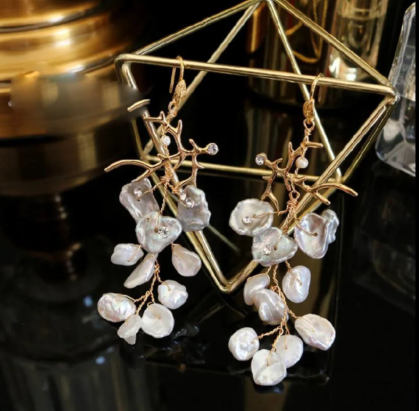 CSxjd Korea Personality Joker Long Earrings Natural Shaped Pearl Exaggerated Earrings
CSxjd Korea Personality Joker Long Earrings Natural Shaped Pearl Exaggerated Earrings