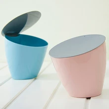 mini waste bin creative fashionable garbage bin rolling cover paper basket kitchen ash-bin PP small size desktop trash bin 
mini waste bin creative fashionable garbage bin rolling cover paper basket kitchen ash-bin PP small size desktop trash bin