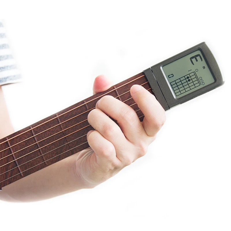 Portable 6-Tone Pocket Guitar Chord Trainer Practice Tools Rotatable Chords Chart Screen guitar finger exerciser for Beginner
Portable 6-Tone Pocket Guitar Chord Trainer Practice Tools Rotatable Chords Chart Screen guitar finger exerciser for Beginner