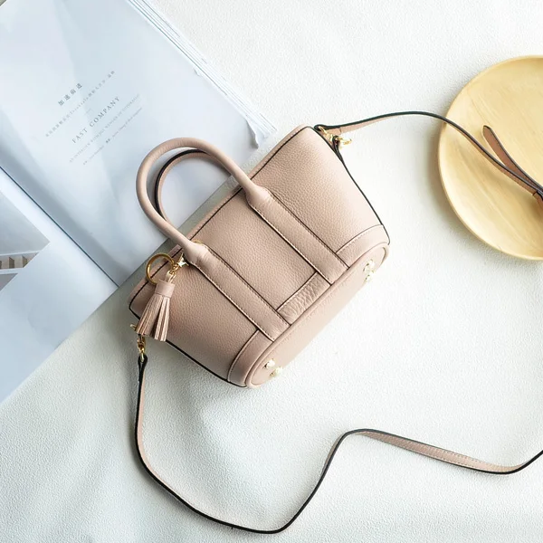 Europe and the new spring and summer leather handbag bag simple cross head layer cowhide temperament MINI Bag Tote Bag
Europe and the new spring and summer leather handbag bag simple cross head layer cowhide temperament MINI Bag Tote Bag