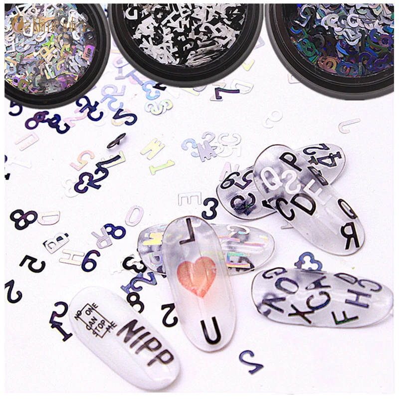 1pcs Nail Sequins English Alphabet Nail Art Glitter Flakes Symphony Laser Digital Nail Decoration Accessories Tools
1pcs Nail Sequins English Alphabet Nail Art Glitter Flakes Symphony Laser Digital Nail Decoration Accessories Tools
