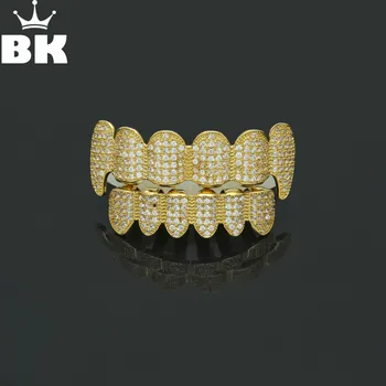 New Custom Fit Hip Hop Shiny Full Iced Out AAA Cubic Zircon Crystal Teeth Grill Gold Fang Top & Bottom Grill Set
New Custom Fit Hip Hop Shiny Full Iced Out AAA Cubic Zircon Crystal Teeth Grill Gold Fang Top & Bottom Grill Set