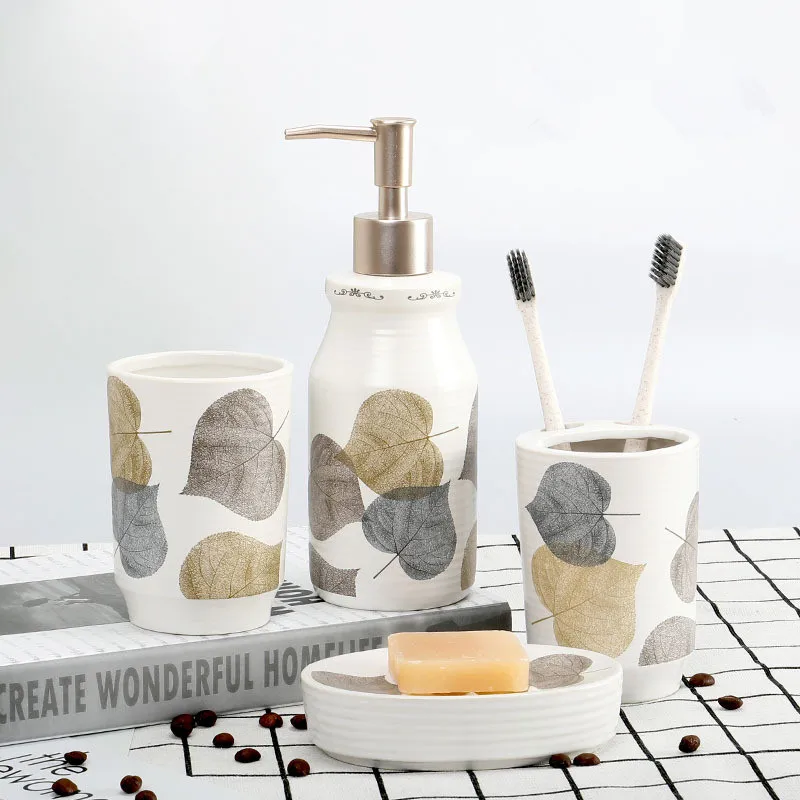 Nordic Leaf Printed Ceramic Bathroom Set Four-piece Toiletries Set Soap Dispenser Dish Cup Toothbrush holder Bathroom Supplies 
Nordic Leaf Printed Ceramic Bathroom Set Four-piece Toiletries Set Soap Dispenser Dish Cup Toothbrush holder Bathroom Supplies