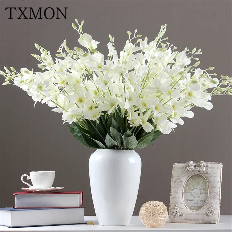 Wedding Road Yinhua Flower Simulation Floral Ocean Orchid Home Living Room Desktop Decoration Flower Arrangement
Wedding Road Yinhua Flower Simulation Floral Ocean Orchid Home Living Room Desktop Decoration Flower Arrangement