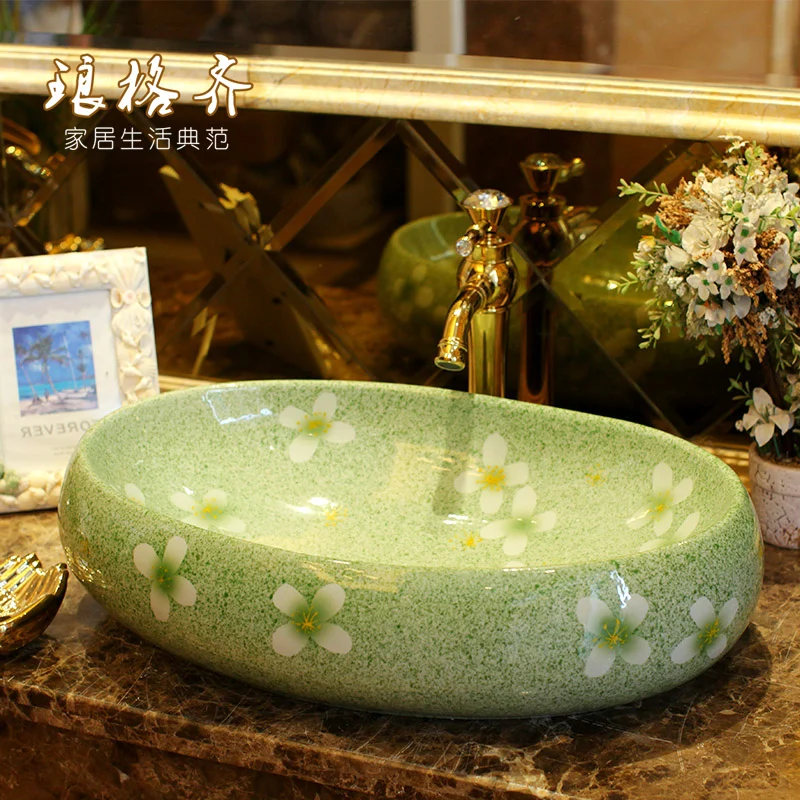 ceramics countertop basin Jingdezhen basin increase the oval basin white jade porcelain art basin
ceramics countertop basin Jingdezhen basin increase the oval basin white jade porcelain art basin
