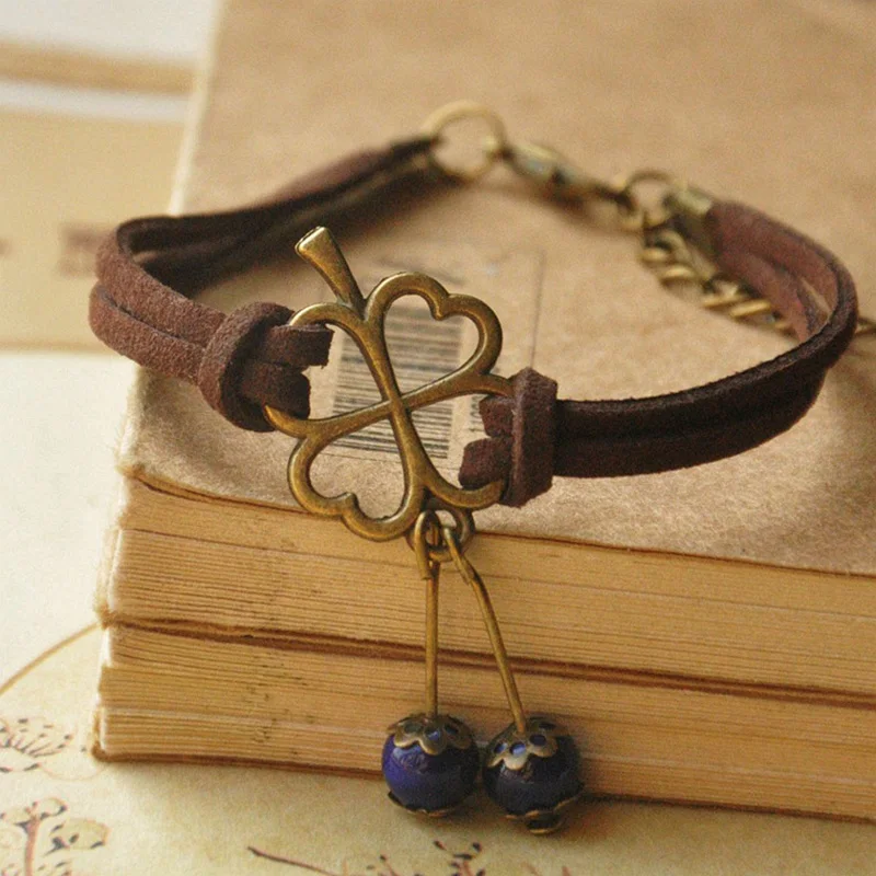 Clover Charm Bracelets Leather Chain Cuff Bangle Flower Ceramic Beads Wristbands Adjustable Women Bohemian Jewelry
Clover Charm Bracelets Leather Chain Cuff Bangle Flower Ceramic Beads Wristbands Adjustable Women Bohemian Jewelry