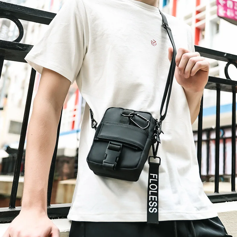 Men shoulder bag Waterproof small hanging bag original design fashion cool shoulder Pack women leisure sports phone bags c50
Men shoulder bag Waterproof small hanging bag original design fashion cool shoulder Pack women leisure sports phone bags c50
