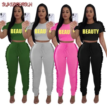 RAISEVERN Letter Print Gold Letter Print Two Piece Set Women Selvedge Ruffles Crop Top And Pants Suits Ensemble Femme Tracksuits
RAISEVERN Letter Print Gold Letter Print Two Piece Set Women Selvedge Ruffles Crop Top And Pants Suits Ensemble Femme Tracksuits