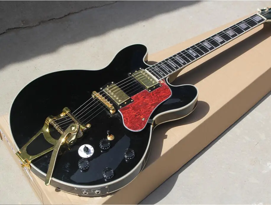 Hot sale ! Black Electric Guitar with Golden Hardwares,Red Pearl Pickguard,Tremolo System,Rosewood Fretboard,offer customized
Hot sale ! Black Electric Guitar with Golden Hardwares,Red Pearl Pickguard,Tremolo System,Rosewood Fretboard,offer customized