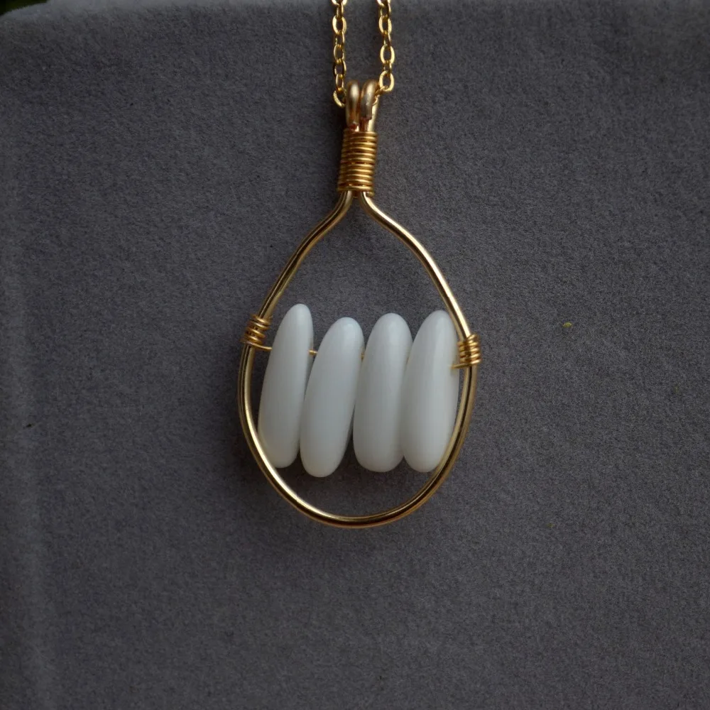 Natural White Porcelain Stone Beads Gold Color Wire Wrapped Pendant Chain Long Necklace Women Choker Boho Fashion Jewelry
Natural White Porcelain Stone Beads Gold Color Wire Wrapped Pendant Chain Long Necklace Women Choker Boho Fashion Jewelry