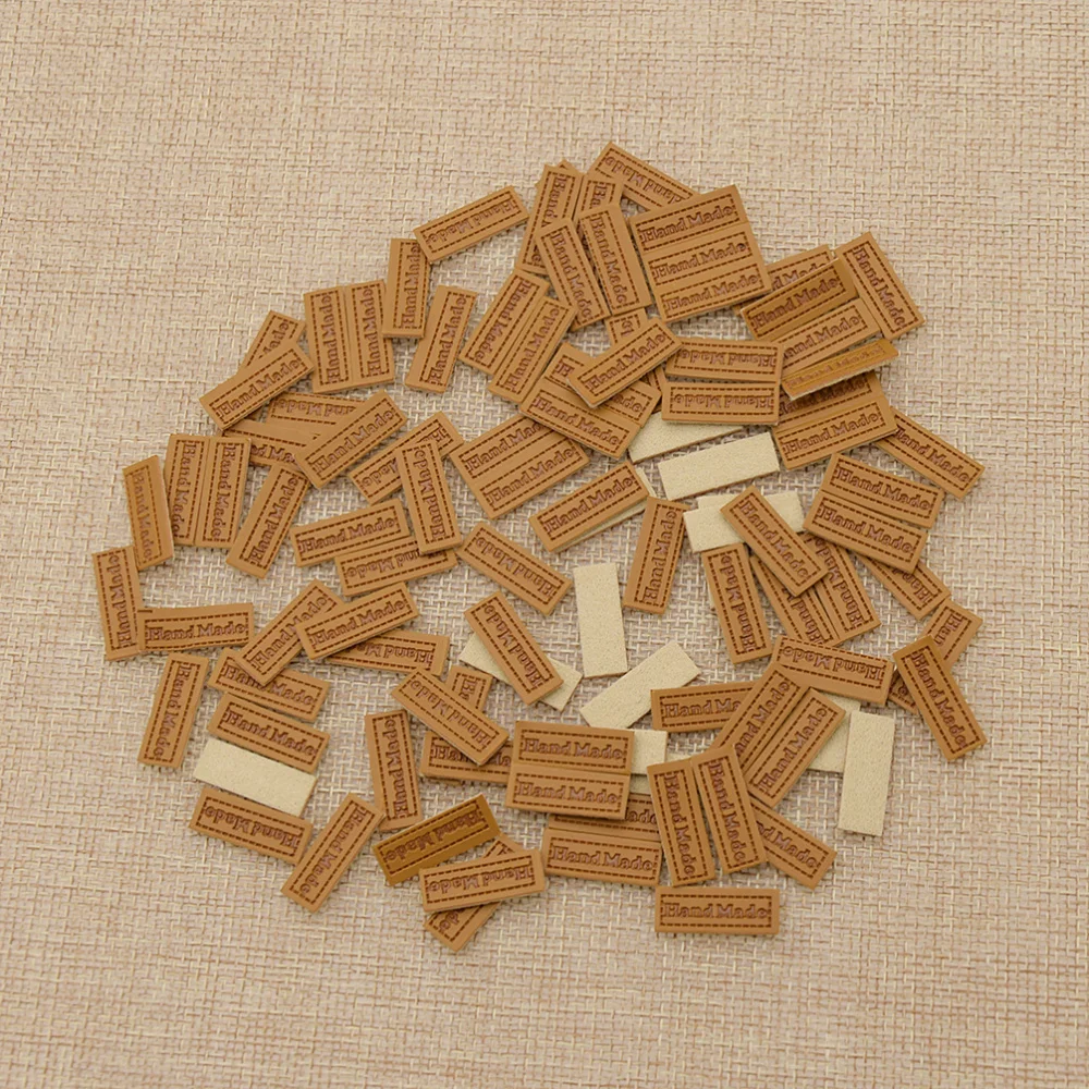 100pcs 20x7mm Classic Brown PU Leather Mini Handmade Label For DIY Handmade Craft Clothes Shoes Bag Sewing On Tags
100pcs 20x7mm Classic Brown PU Leather Mini Handmade Label For DIY Handmade Craft Clothes Shoes Bag Sewing On Tags