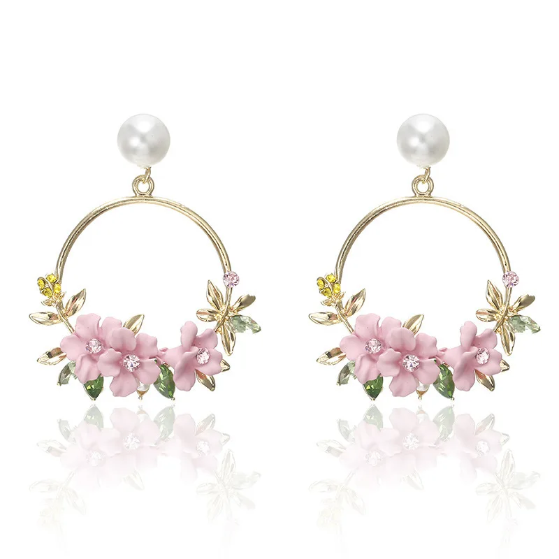 Korean version of INS net red flower ear nails with sweet soft pottery pearl earrings earrings
Korean version of INS net red flower ear nails with sweet soft pottery pearl earrings earrings