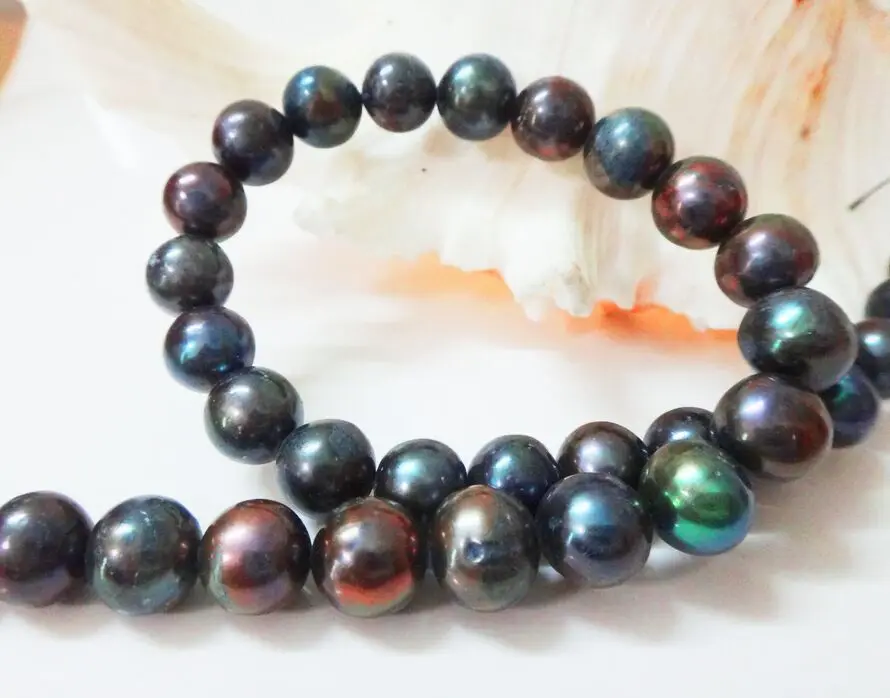 19" 18"9-10MM NATURAL TAHITIAN GENUINE BLACK PEACOCK RED NEAR ROUND PEARL NECKLACE (0926)
19" 18"9-10MM NATURAL TAHITIAN GENUINE BLACK PEACOCK RED NEAR ROUND PEARL NECKLACE (0926)