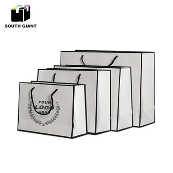 Custom Logo Garment Gift Paper Bags with Handles Small Big Durable Black White Wedding Decoration White Paperboard Bags
Custom Logo Garment Gift Paper Bags with Handles Small Big Durable Black White Wedding Decoration White Paperboard Bags