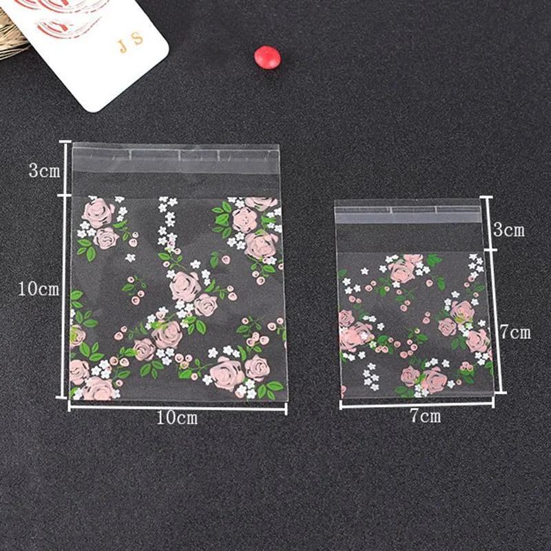 100Pcs Rose Flowers Candy Cookie Bags Wedding Party Gift Bag Self Adhesive Plastic Jelly Biscuit Packaging Bag Freeshipping
100Pcs Rose Flowers Candy Cookie Bags Wedding Party Gift Bag Self Adhesive Plastic Jelly Biscuit Packaging Bag Freeshipping