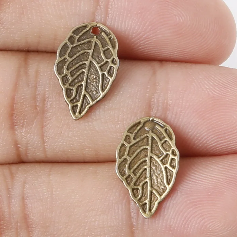 New Arrival 14pcs 16x10mm Antique Bronze Metal Pendant Leaves Charms Jewelry Findings Accessories for DIY Choker
New Arrival 14pcs 16x10mm Antique Bronze Metal Pendant Leaves Charms Jewelry Findings Accessories for DIY Choker