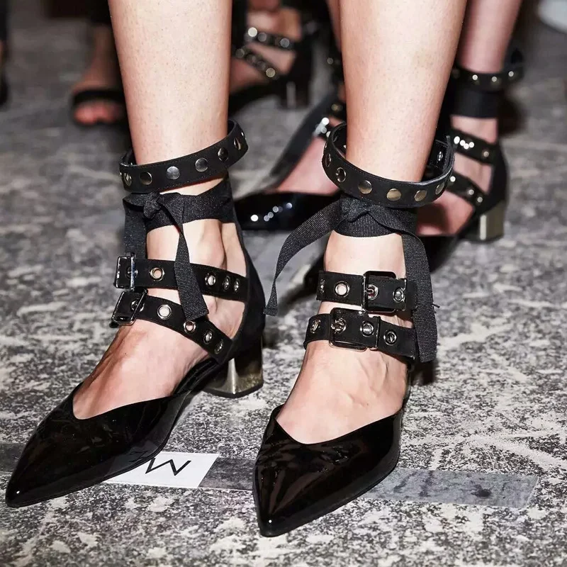 New European and American style pointy rough with a word with a rivet single shoe buckle strap buckle Roman women's shoes
New European and American style pointy rough with a word with a rivet single shoe buckle strap buckle Roman women's shoes