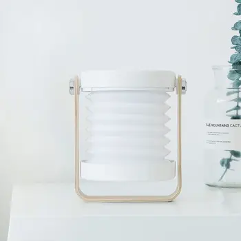 Creative wooden handle portable lantern lamp telescopic folding led table lamp charging night light reading lamp
Creative wooden handle portable lantern lamp telescopic folding led table lamp charging night light reading lamp