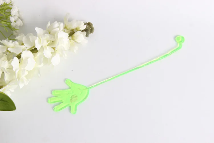 Description Picture 4 of item10Pcs Sticky Hands Kids Party Favors Supplies Carnival Prize Assorted Colors Pinata Funny party favors for children Dressing