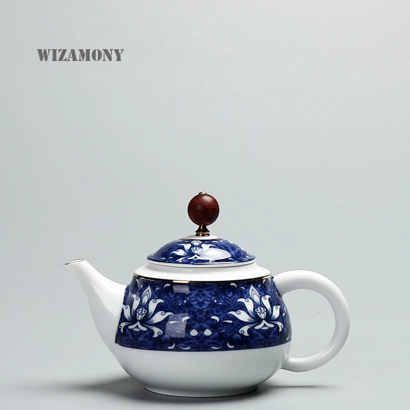 WIZAMONY New tea set Blue and white Golden Line Celadon Zisha Ceramics Arts Tay China Tea pot Porcelain yixing Antique Teapot
WIZAMONY New tea set Blue and white Golden Line Celadon Zisha Ceramics Arts Tay China Tea pot Porcelain yixing Antique Teapot