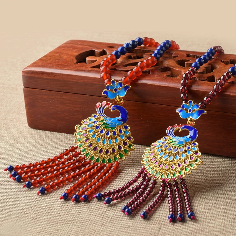 Garnet Sweater Chain Necklace Female Red Crystal Sweater Chain Peacock Pendant Crystal Fringe Jewelry
Garnet Sweater Chain Necklace Female Red Crystal Sweater Chain Peacock Pendant Crystal Fringe Jewelry