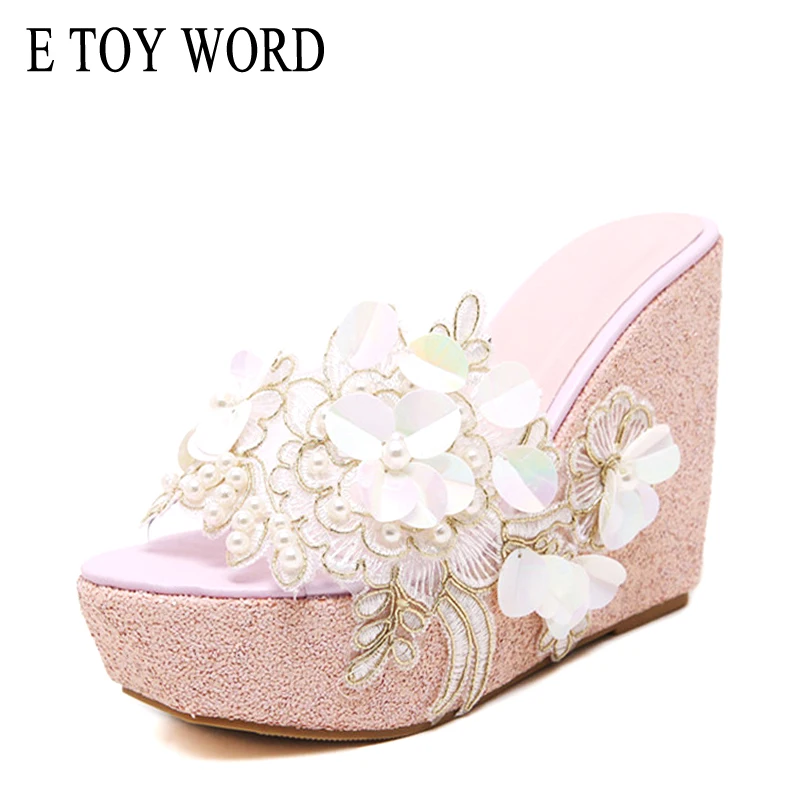 E TOY WORD Summer slipper Beaded flowers platform wedges women slippers fashion flip flops bohemian national style women sandals
E TOY WORD Summer slipper Beaded flowers platform wedges women slippers fashion flip flops bohemian national style women sandals