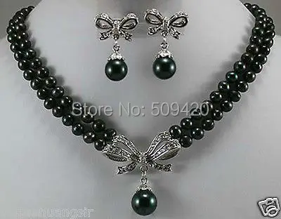 Free Shipping>>>>2 Rows black pearl necklace inlaid crystal bow pendant earring set
Free Shipping>>>>2 Rows black pearl necklace inlaid crystal bow pendant earring set